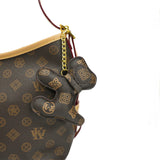 Bolso de hombro y llavero de cachorro